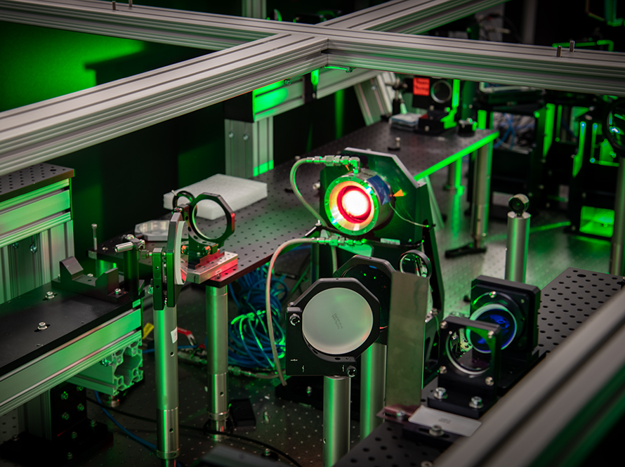 Optical equipment illuminated with green light at the Berkeley Lab Laser Accelerator Center