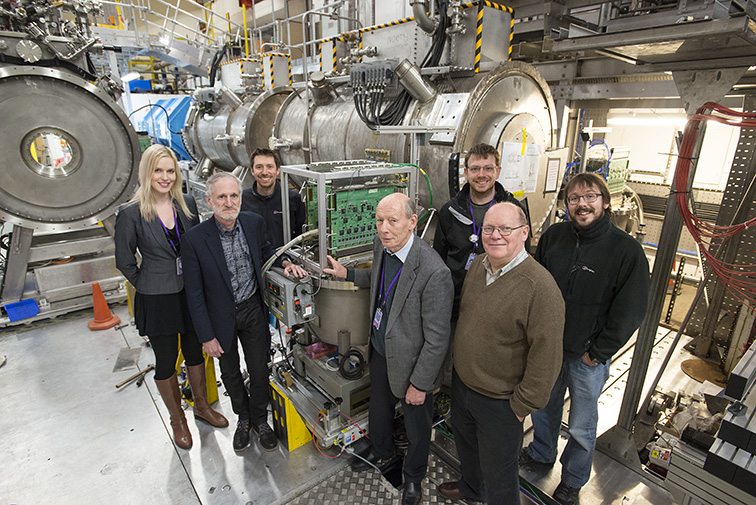 Photo - Members of the MICE facility team during construction of the experiment at STFC's Rutherford Appleton Laboratory in 2015. (Credit: MICE collaboration)