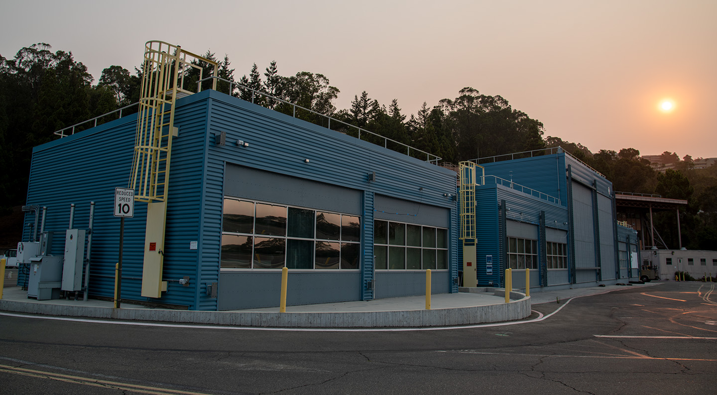 Exterior view of a rotating bed test unit and facility.
